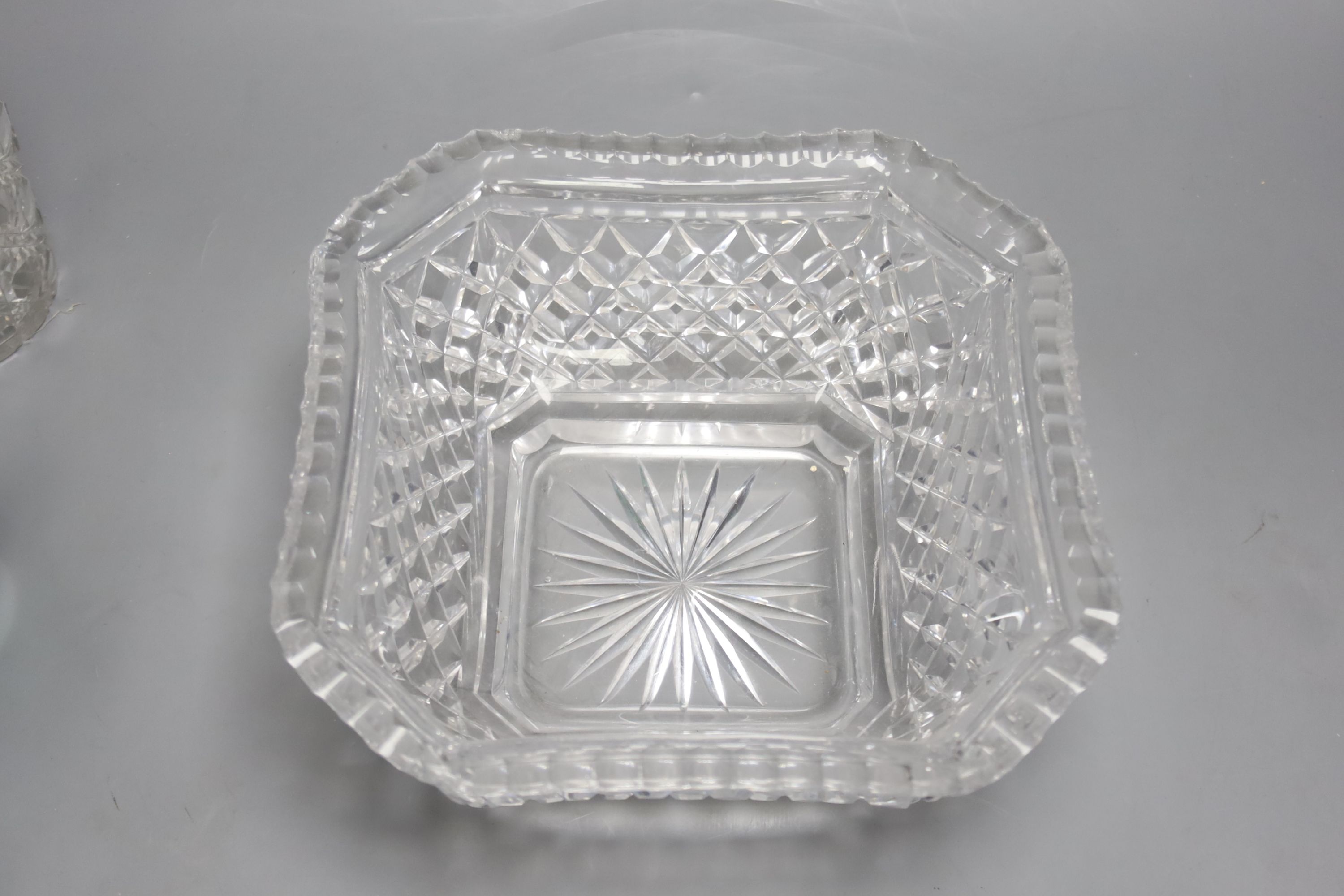 Two green glass dumps, a heavy cut glass bowl and a decanter